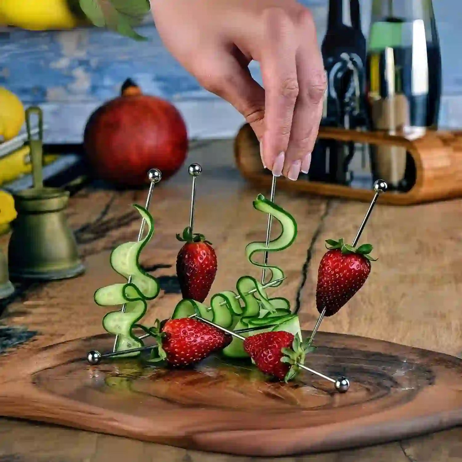 Strawberries and sliced cucumber as garnishes